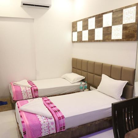 Hotel Magnum Airport T-2 มุมไบ ภายนอก รูปภาพ
